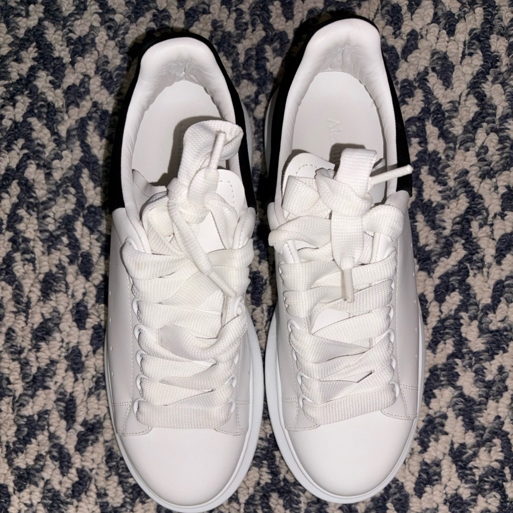 Black and white AlexanderMcQueen fits me as a 6.5! Only worn once authentic